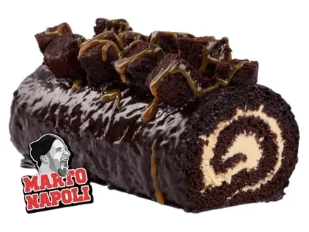 Chocolate Yule log topped with brownies and a caramel drizzle