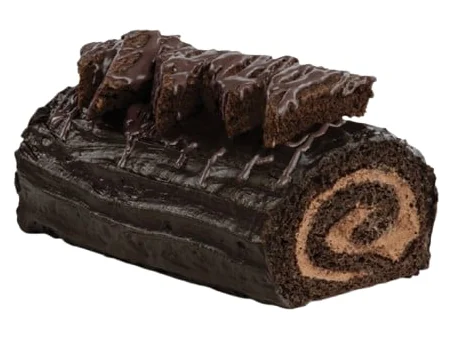 Chocolate Yule log topped with brownies and a chocolate drizzle